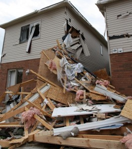 This home in Angus, Ontario was severely damaged after being struck by the roof of another house.