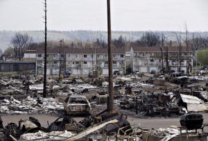 The devastated neighbourhood of Abasand is shown in Fort McMurray, Alta., on Friday, May 13, 2016. A wildfire left a swath of destruction last week. THE CANADIAN PRESS/Jason Franson