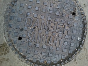 In a study, the City of Hamilton found that a submerged sanitary manhole cover with two pick axe holes can allow up to two litres of stormwater per second into the sanitary sewer system.